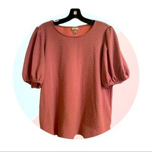 Puffy sleeved pink blouse